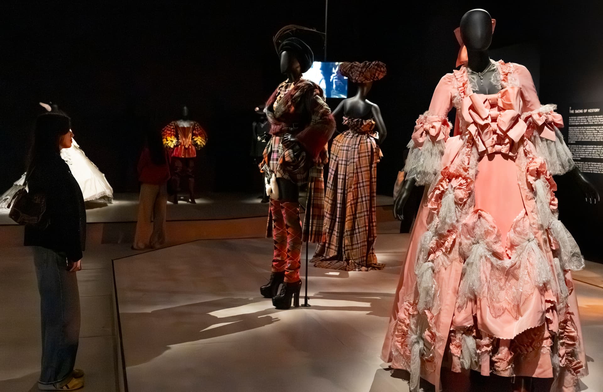 Westwood and McQueen gowns installed in The 90s: Art and Fashion at Tate Britain